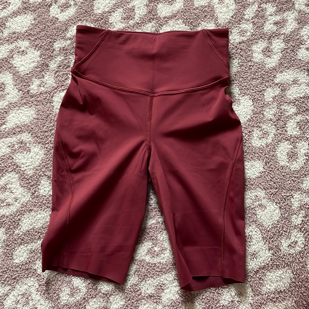 NWOT red lululemon biker shorts size 2